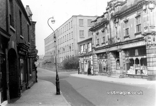 Hollins Mill dominates, looking down Stockport Road