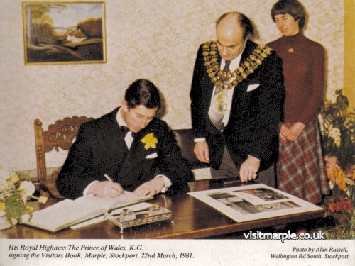 Prince Charles signs the guest book in 1981