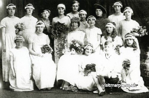 Marple Rose Queen and her retinue - Miss Irene Beard, Rose Queen of the Marple Congregational Church with the Rose-bud Queen (M. Jarvis) and the Dowager Queen (May Ford). From Marple Local History Society Archives.