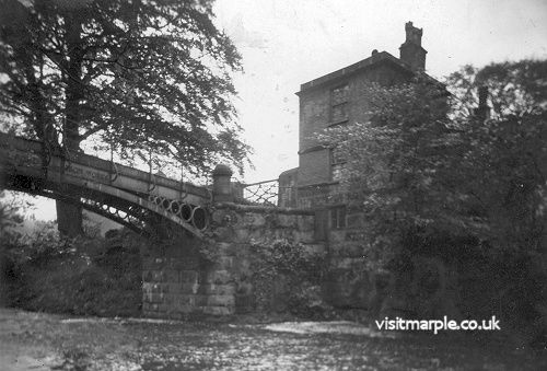 An early shot of the Iron Bridge in Brabyns Park. Notice the spiked gate still in place. From Marple Local History Society Archives. 