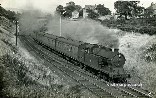 The 3:05pm Manchester (London Road) to Macclesfield Central train pulled by Class A5 4-6-2.T. No 69823 near Rose Hill on 8 September 1956.