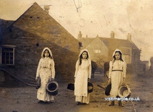3 maids a milking outside the Manor House, Hawk Green