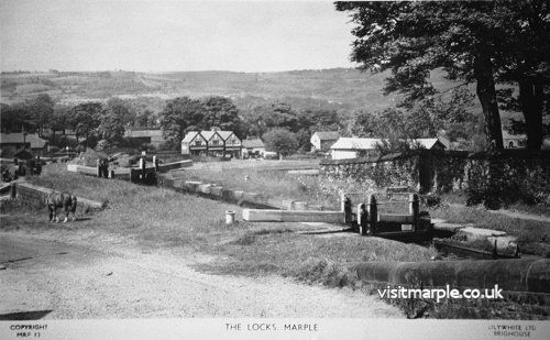 A very attractive and peaceful view of Top Lock, not very different today apart from the motor cars of course.